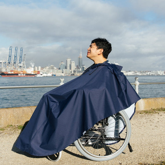Man wearing Wheelchair Rain Coat outdoor full body
