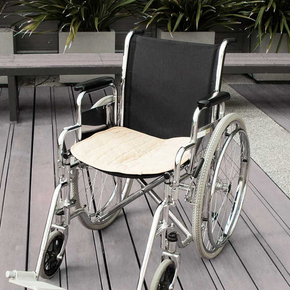 Beige waterproof Pad on wheelchair